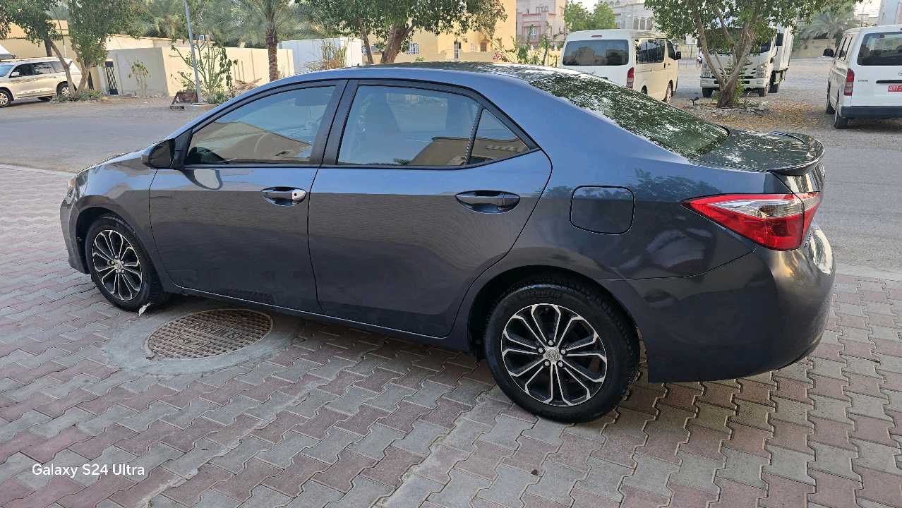 Car Image 2015 TOYOTA COROLLA LE