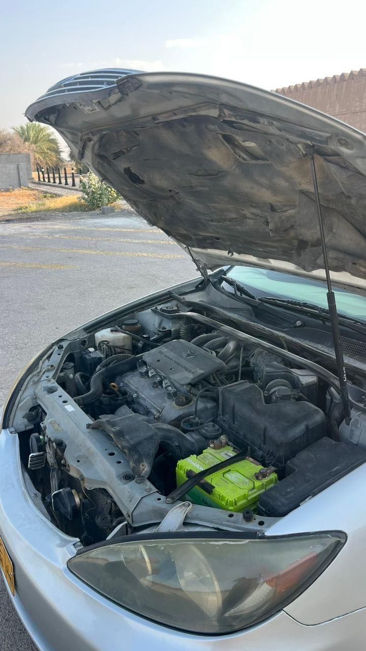 Car Image 2004 TOYOTA CAMRY GLE