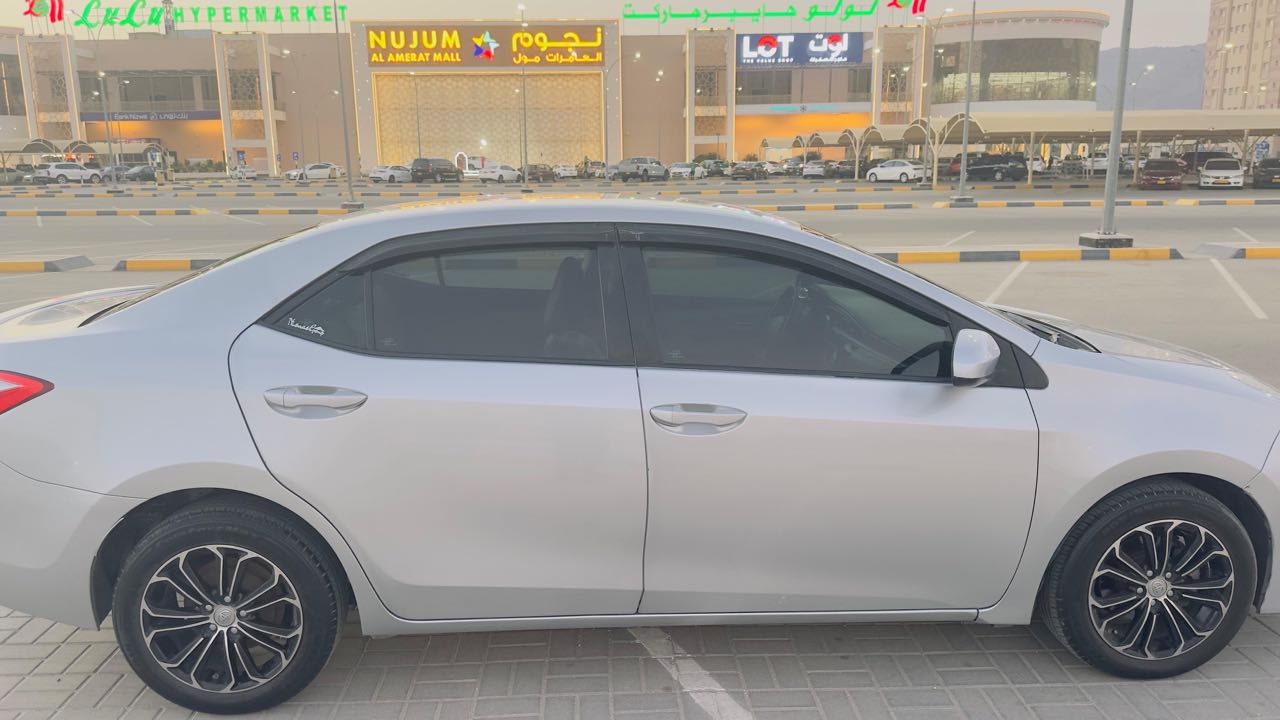 Car Image 2015 TOYOTA COROLLA LE