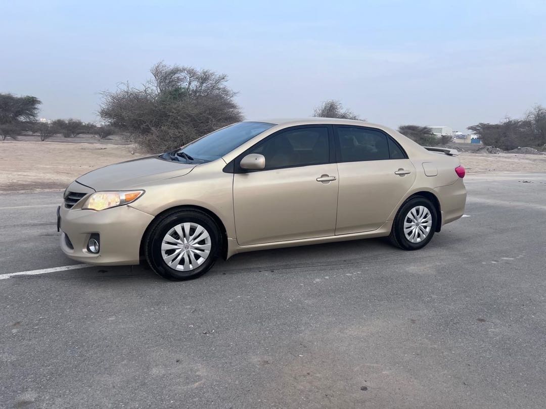 Car Image 2011 TOYOTA COROLLA LE